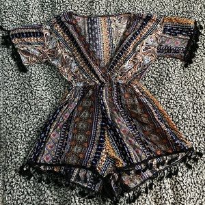 Patterned romper with black dangles